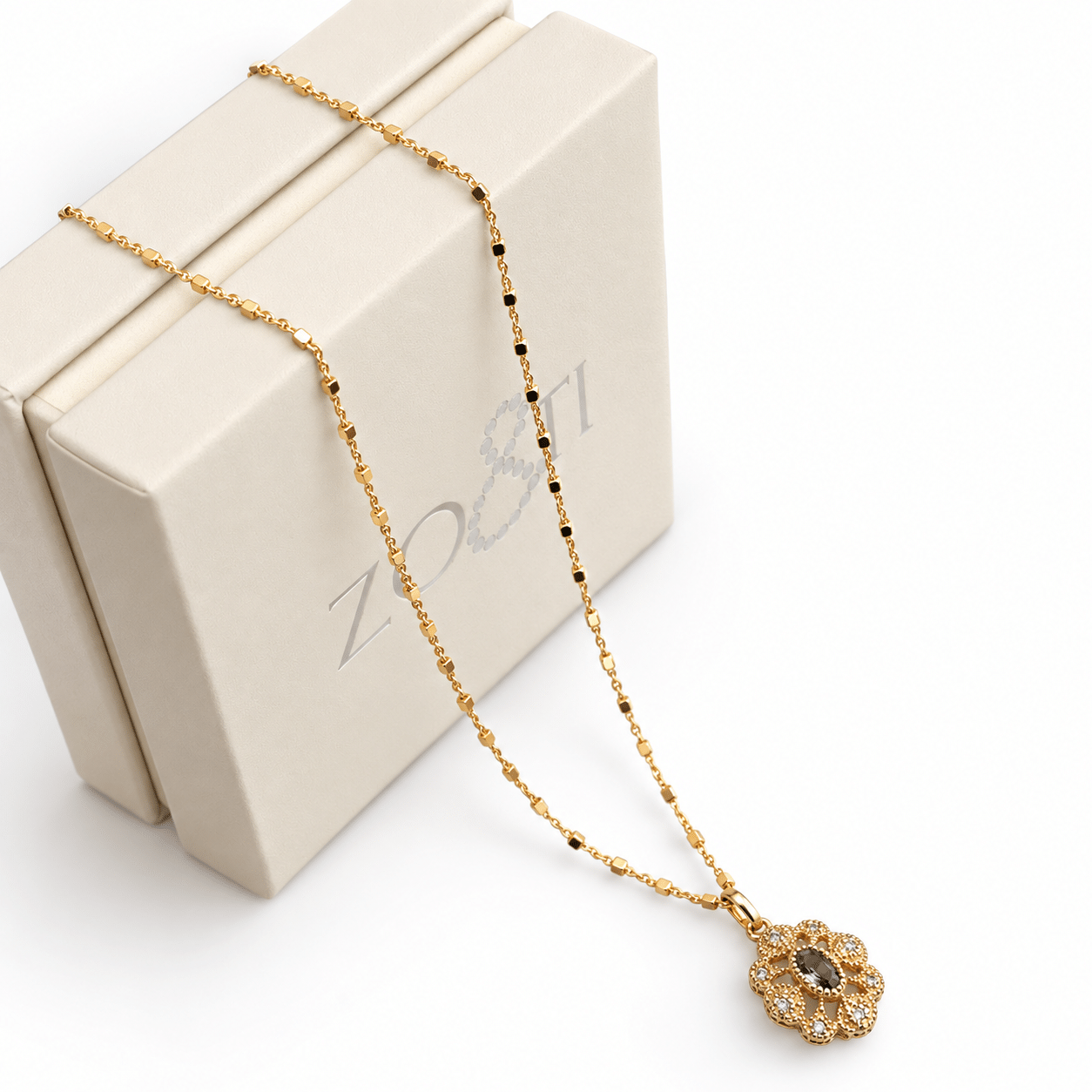 Collier avec pendentif vintage en Argent doré et plaqué-or-Ginette